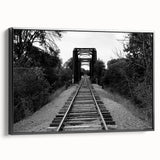 Framed black canvas wall art featuring a landscape railroad design, showcasing intricate details and vibrant colors, perfect for modern home decor.