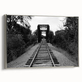 Framed canvas wall art showcasing a serene landscape with a railroad, featuring silver accents and a modern design, perfect for enhancing home decor.
