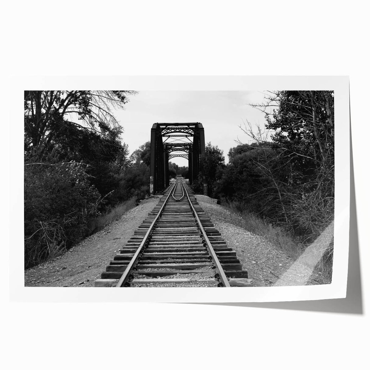 Colorful landscape railroad wall art print showcasing vibrant scenery with trains and tracks, rolled and ready for display, ideal for home decor enthusiasts.