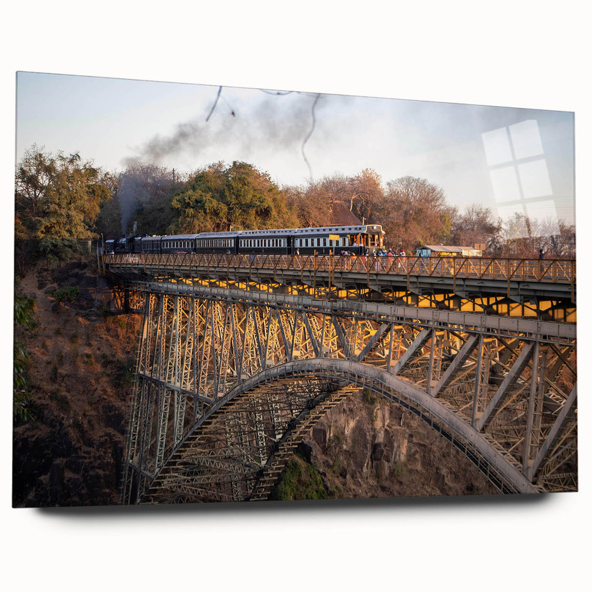 Acrylic glass wall art collection showcasing a vibrant landscape with a railroad theme, featuring rich colors and detailed textures, displayed elegantly from the side.