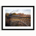Framed landscape wall art featuring a serene railroad scene, with a black mat and sleek black frame, perfect for home decor and enhancing interior aesthetics.