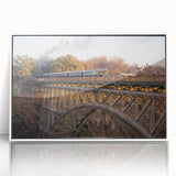 Framed acrylic wall art featuring a serene railroad landscape design with vibrant colors, ideal for modern home decor and art enthusiasts.