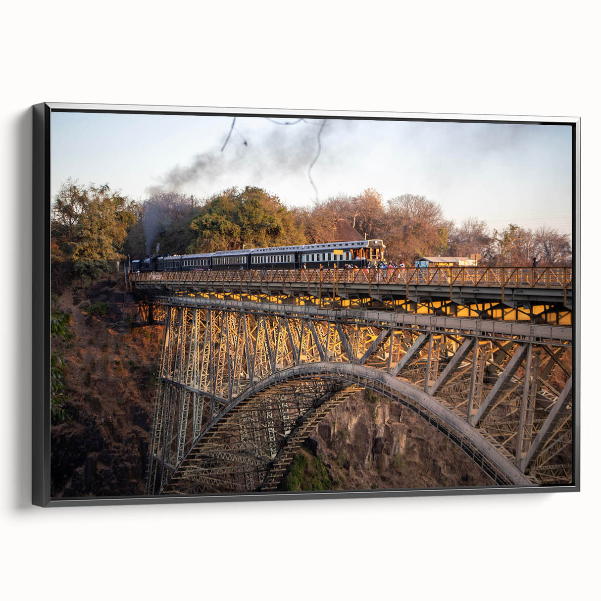 Framed canvas wall art depicting a scenic railroad landscape, showcasing vibrant colors and intricate details, with a sleek black frame emphasizing its modern aesthetic.