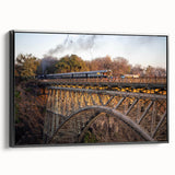 Framed canvas wall art depicting a scenic railroad landscape, showcasing vibrant colors and intricate details, with a sleek black frame emphasizing its modern aesthetic.