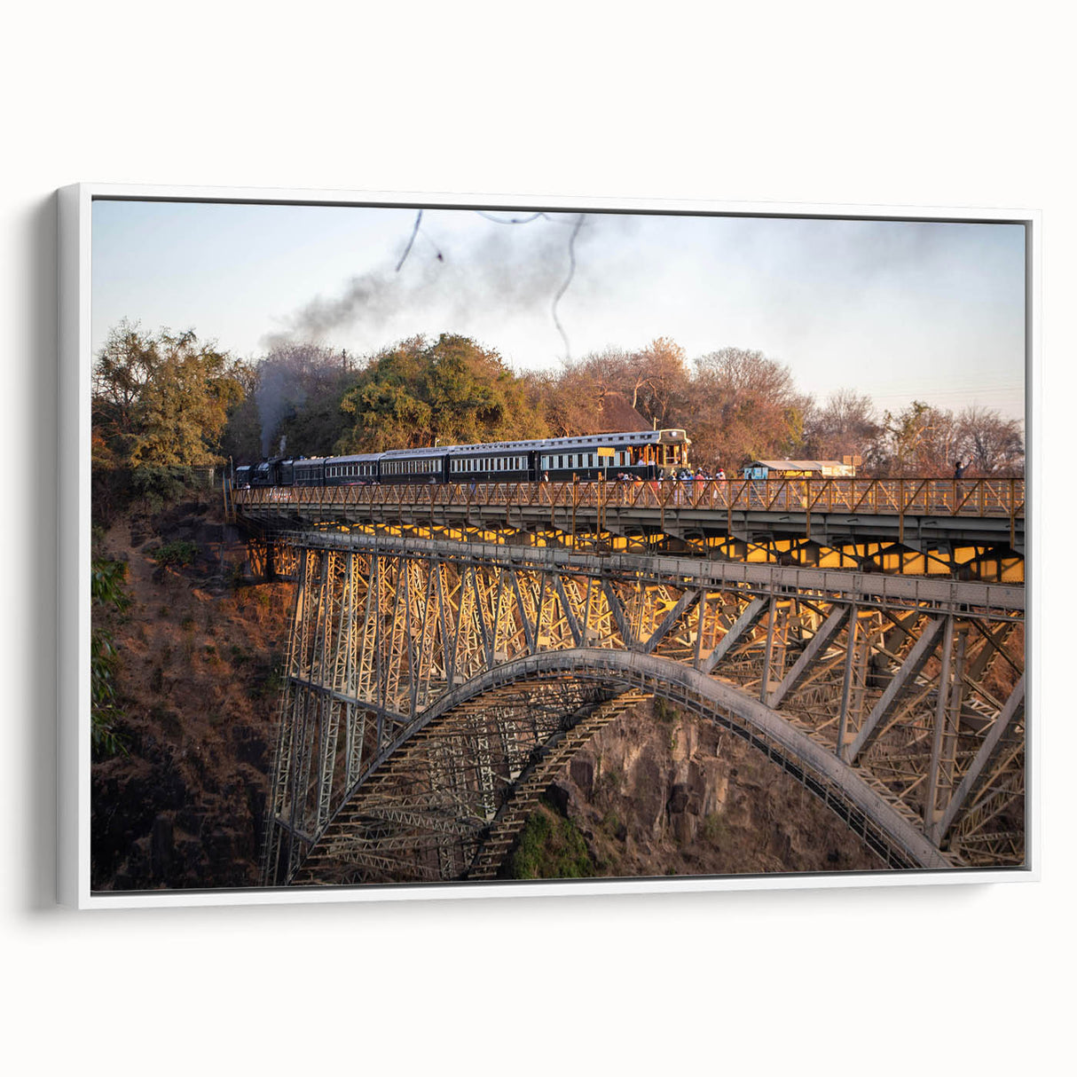 Framed canvas wall art featuring a serene landscape with a railroad running through lush greenery, designed to enhance home decor with a tranquil vibe.