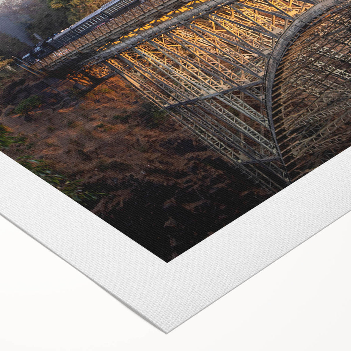 Rolled canvas artwork showcasing a vibrant landscape with railroad tracks winding through lush greenery, ideal for home decor. Textured finish enhances visual appeal.