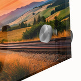 Close-up view of a vibrant acrylic glass wall art collection featuring a railroad landscape design, showcasing intricate details and rich colors. Ideal for modern home decor.