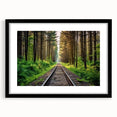 Framed wall art featuring a stunning railroad landscape design, showcased in a sleek black frame with a decorative mat, ideal for enhancing home decor aesthetics.