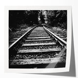 Vibrant rolled print showcasing a scenic landscape with railroad tracks, designed for wall art decor, featuring rich colors and intricate details, perfect for modern interiors.