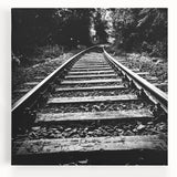 Stretched canvas artwork depicting a tranquil railroad landscape, showcasing vibrant colors and intricate details, ideal for home or office decor.