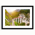 Framed landscape railroad wall art collection featuring a black mat and sleek design, showcasing serene train tracks through lush greenery, ideal for home decor.