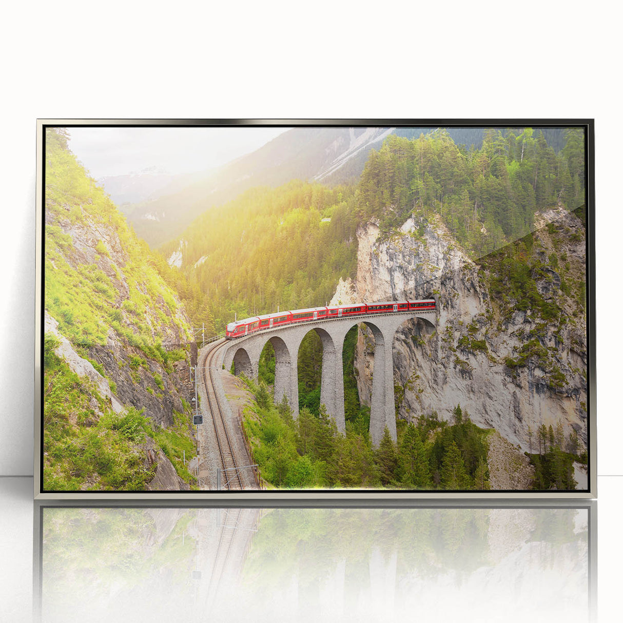 Framed acrylic wall art collection showcasing a serene landscape with railroad tracks, featuring silver accents and a modern design, perfect for enhancing any room decor.
