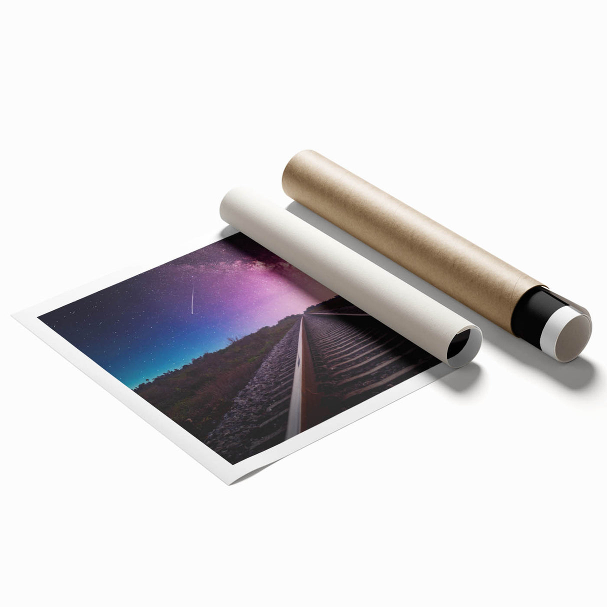 Rolled print showcasing a vibrant landscape of a railroad crossing through lush greenery, designed for wall art decor, highlighting intricate details and colors.