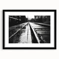 Framed wall art collection showcasing a stunning landscape with railroad design, featuring a sleek black frame and mat, ideal for modern decor.