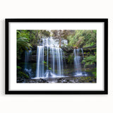 Framed rainforest landscape wall art with a black mat and sleek frame, showcasing vibrant greenery and serene nature, perfect for home decor or office spaces.