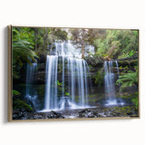 Framed canvas wall art showcasing a vibrant rainforest landscape design, featuring rich greens and gold accents, ideal for enhancing modern home decor.