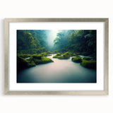 Framed wall art featuring a lush rainforest landscape design with vibrant greens and intricate details, set in a sleek silver frame with a white mat.