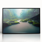 Framed acrylic wall art showcasing a vibrant rainforest landscape design with lush greenery and colorful flora, set in a sleek black frame for modern decor.