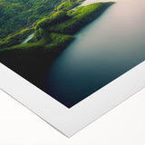 Vibrant rainforest landscape canvas wall art featuring lush green foliage and exotic plants, ideal for nature-inspired decor, rolled for easy display and shipping.