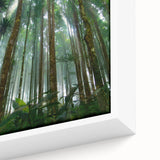 Close-up of a vibrant rainforest landscape wall art piece, featuring lush greenery and intricate detailing, framed elegantly for a contemporary decor style. This striking canvas print adds a touch of nature-inspired elegance to any room, perfect for art enthusiasts and home decorators.