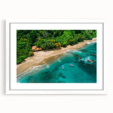 Framed landscape wall art featuring a vibrant rainforest design with lush greenery and colorful flora, presented in a sleek white frame with a mat. Perfect for adding a touch of nature to any space.