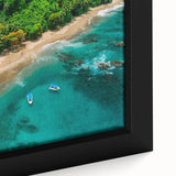 Framed canvas wall art showcasing a vibrant rainforest design with lush green foliage and colorful tropical flowers, perfect for adding a nature-inspired touch to home decor.