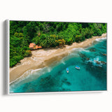 Framed canvas wall art showcasing a vibrant rainforest landscape design, featuring lush green foliage and tropical colors, displayed in a white frame.