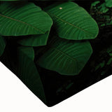 Close-up of a vibrant rainforest landscape canvas wall art, showcasing lush green foliage and intricate details, perfect for nature-inspired decor in any room.