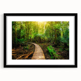Black-framed wall art featuring a vibrant rainforest landscape design with lush greenery and intricate details, ideal for enhancing home decor aesthetics.