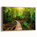 Framed canvas wall art featuring a lush rainforest design with vibrant greenery and golden accents, ideal for adding a natural touch to home decor.