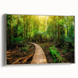 Framed canvas artwork showcasing a vibrant rainforest landscape design with lush greenery and rich colors, elegantly displayed with a silver frame. Ideal for nature lovers.