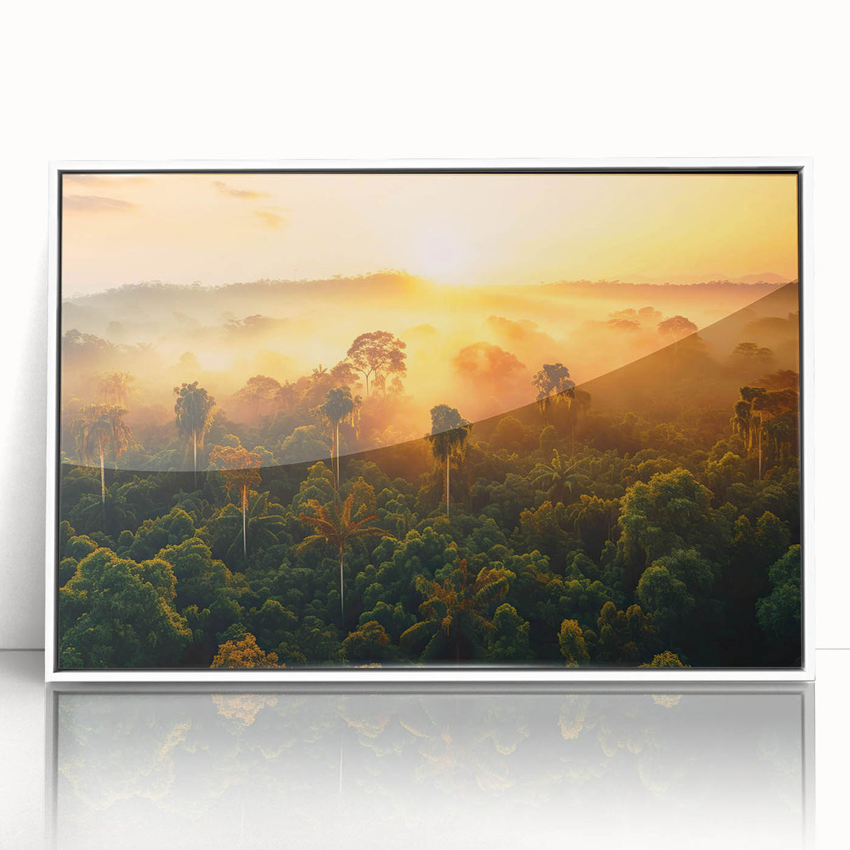 Framed wall art depicting a vibrant rainforest landscape, featuring lush green foliage and a serene atmosphere, designed to enhance modern home decor.