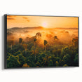 Framed canvas wall art of a vibrant rainforest landscape featuring lush greenery and rich colors, displayed in a sleek black frame, perfect for home decor.