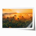 Vibrant rainforest landscape wall art print showcasing lush greenery and tropical flora, rolled for easy shipping and display in any decor setting.