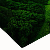 Close-up of a vibrant rainforest landscape wall art design on stretched canvas, showcasing lush green foliage and rich textures, ideal for nature-themed decor.