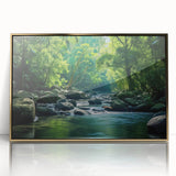 Framed acrylic wall art showcasing a vibrant rainforest landscape with lush greenery and subtle gold accents, designed to enhance modern decor aesthetics. This piece adds a touch of nature's beauty to any space.
