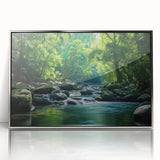 Framed wall art piece showcasing a vibrant rainforest landscape design, featuring lush greenery and intricate details in a sleek silver frame, ideal for enhancing interior decor.