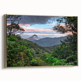 Framed canvas wall art showcasing a vibrant rainforest landscape with rich greens and gold accents, ideal for adding a touch of nature to modern decor.