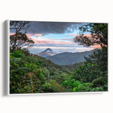 Framed wall art showcasing a vibrant rainforest landscape design on canvas, featuring lush green foliage and vivid colors, displayed from a side view against a white background. Perfect for enhancing home decor with a nature-inspired theme.