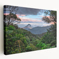 Stretched canvas artwork showcasing a vibrant rainforest landscape design, featuring rich greens and earthy tones, perfect for enhancing home decor.