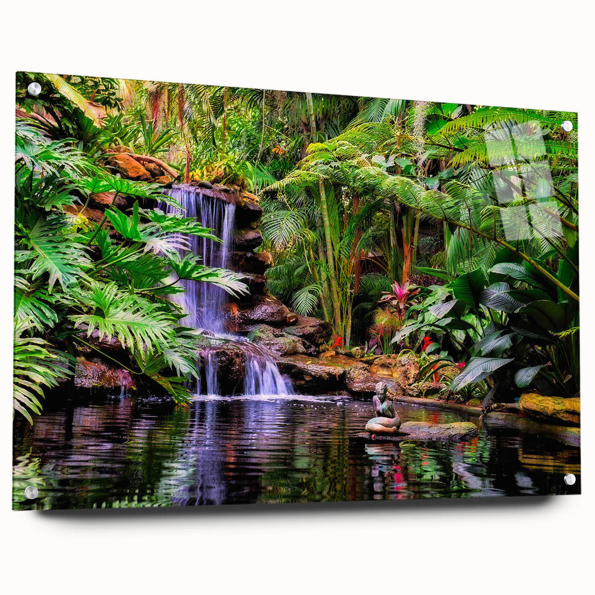 Acrylic glass wall art featuring a vibrant rainforest landscape design, showcasing lush greenery and tropical elements, displayed from a side view with pins for mounting.