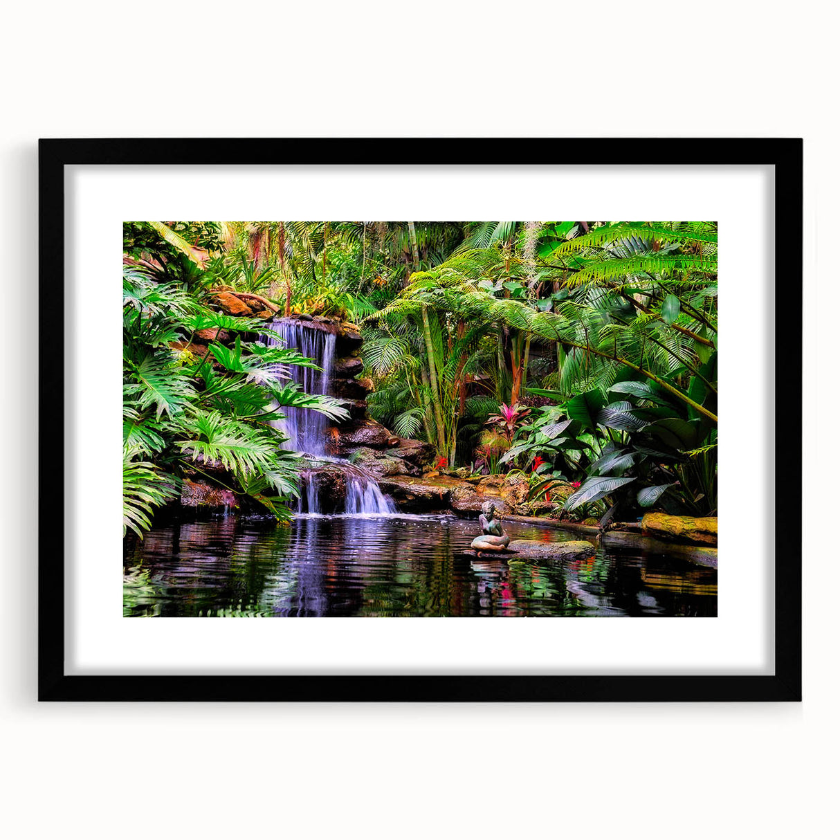 Framed rainforest landscape wall art with a black mat and sleek frame, showcasing vibrant green foliage and serene natural elements, perfect for home decor.