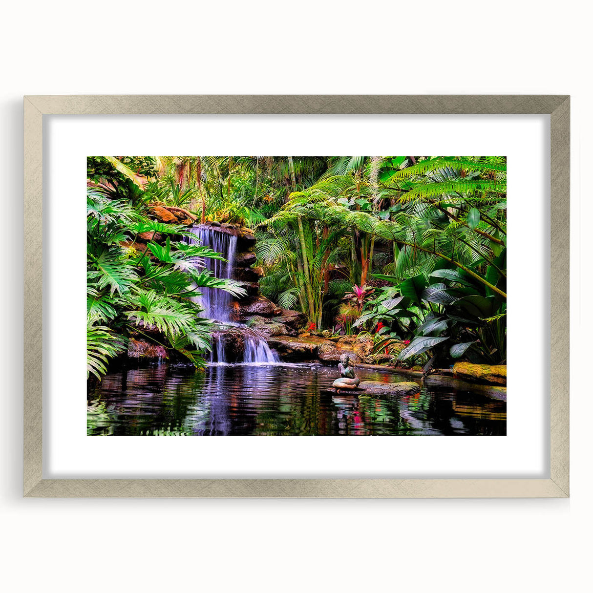 Framed rainforest landscape wall art with a silver mat, showcasing vibrant greens and earthy tones, ideal for enhancing home decor in nature-inspired settings.