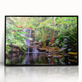 Framed acrylic wall art showcasing a vibrant rainforest landscape design with rich green hues and intricate details, set in a sleek black frame, ideal for home decor.