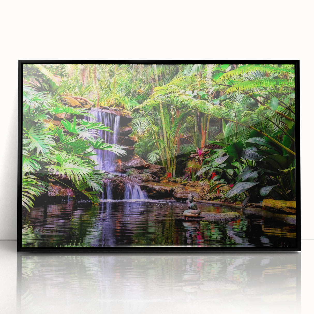 Framed acrylic wall art showcasing a vibrant rainforest landscape design with rich green hues and intricate details, set in a sleek black frame, ideal for home decor.