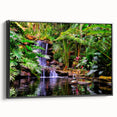 Framed black canvas wall art featuring a vibrant rainforest landscape design, showcasing lush greenery and vivid colors, ideal for enhancing modern decor.