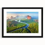 Framed rainforest landscape wall art collection with a black mat and frame, showcasing vibrant greens and earthy tones, perfect for home decor.