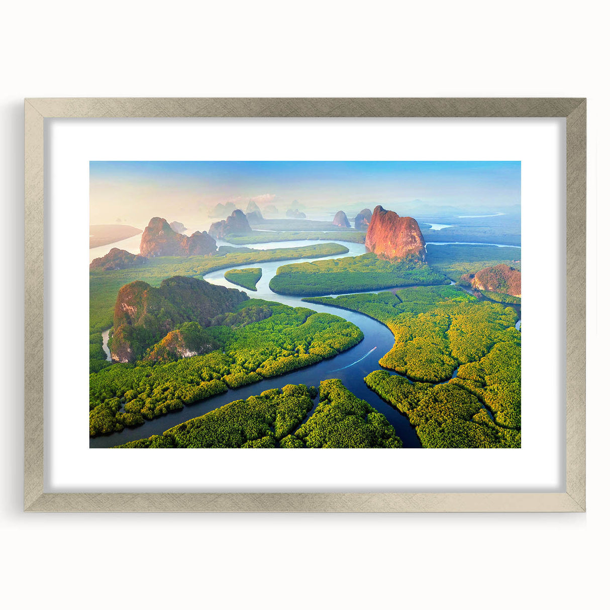 Framed rainforest landscape wall art collection showcasing vibrant green foliage and intricate details, presented in a sleek silver frame with a mat.