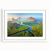 Framed rainforest landscape wall art collection showcasing vibrant green foliage and serene natural beauty, designed to enhance home decor with a white mat finish.