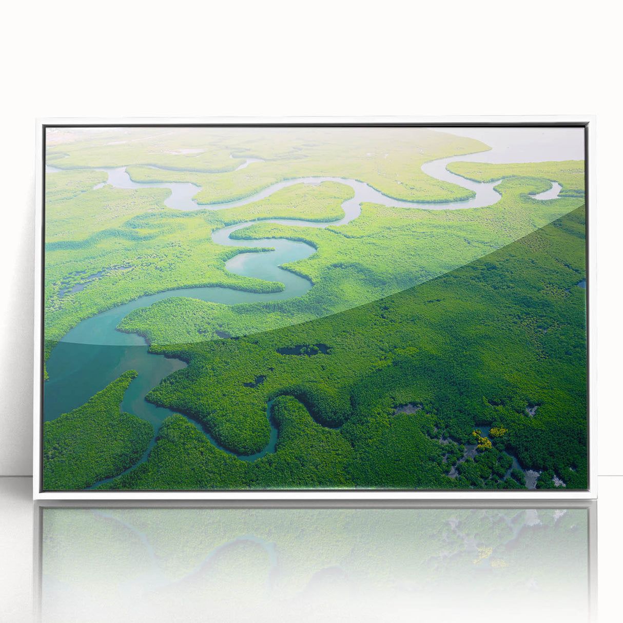 Framed acrylic wall art depicting a vibrant rainforest landscape, featuring lush green foliage and bright tropical flowers, showcased against a white frame for a modern touch.